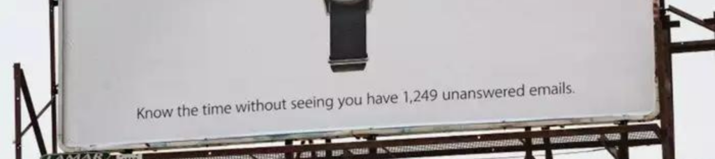 Billboard advertisement by Timex that demonstrates their creative marketing saying 'know the time wihtout seeing you have 1,249 unanswered emails'